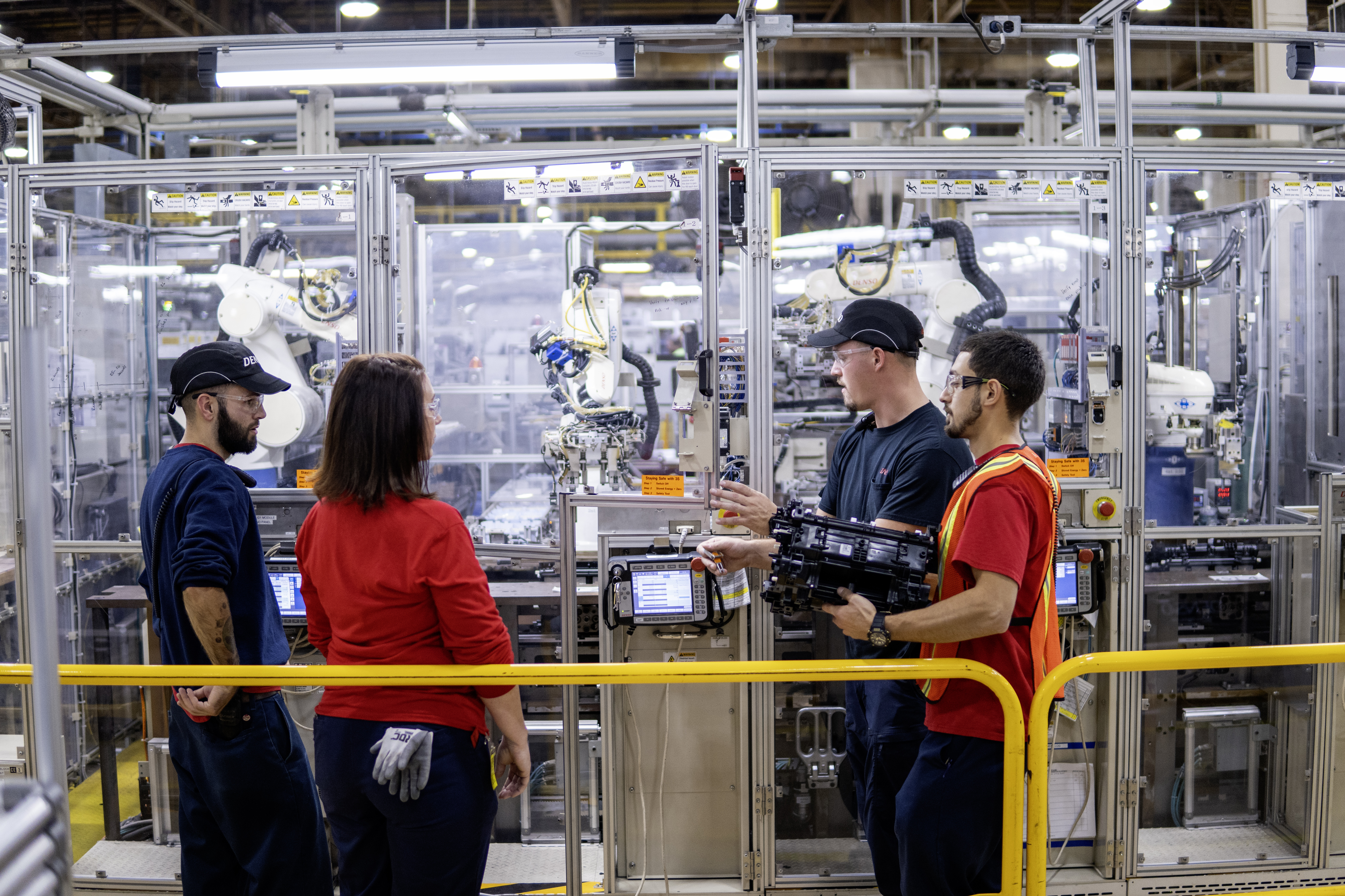 DENSO Team Members Collaborating