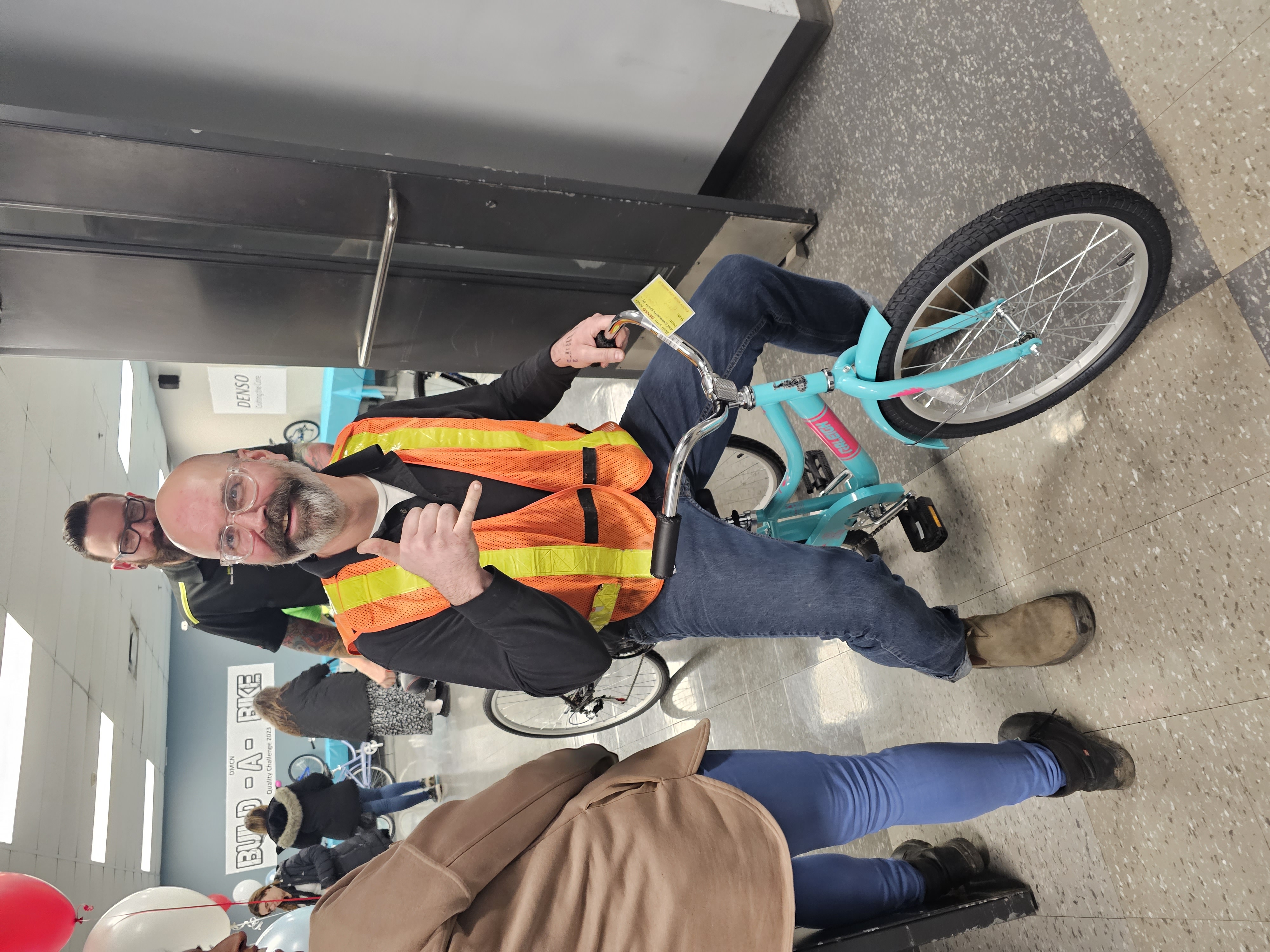 Man Rides Bike and smiles