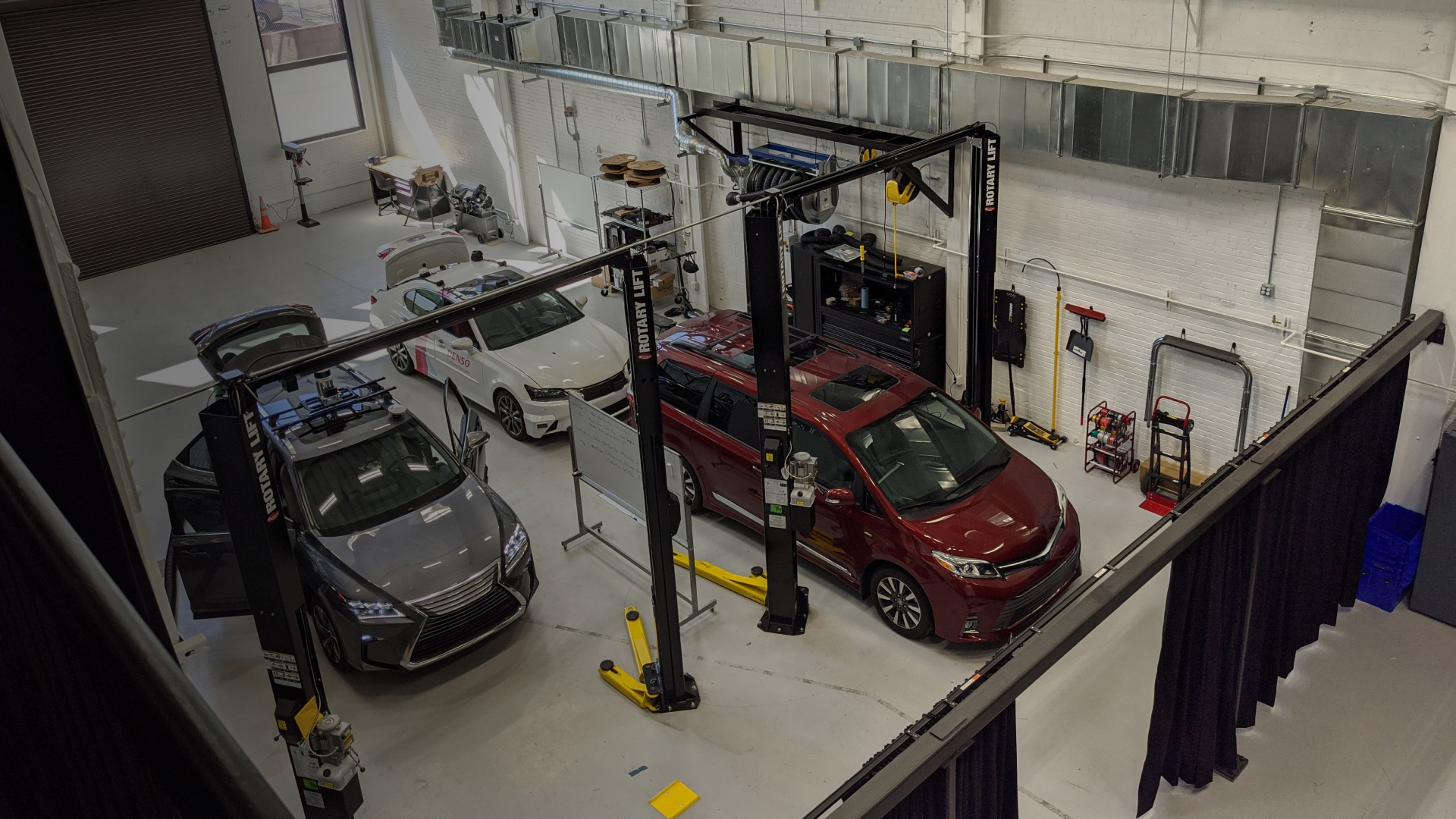 Vehicles in lab for testing