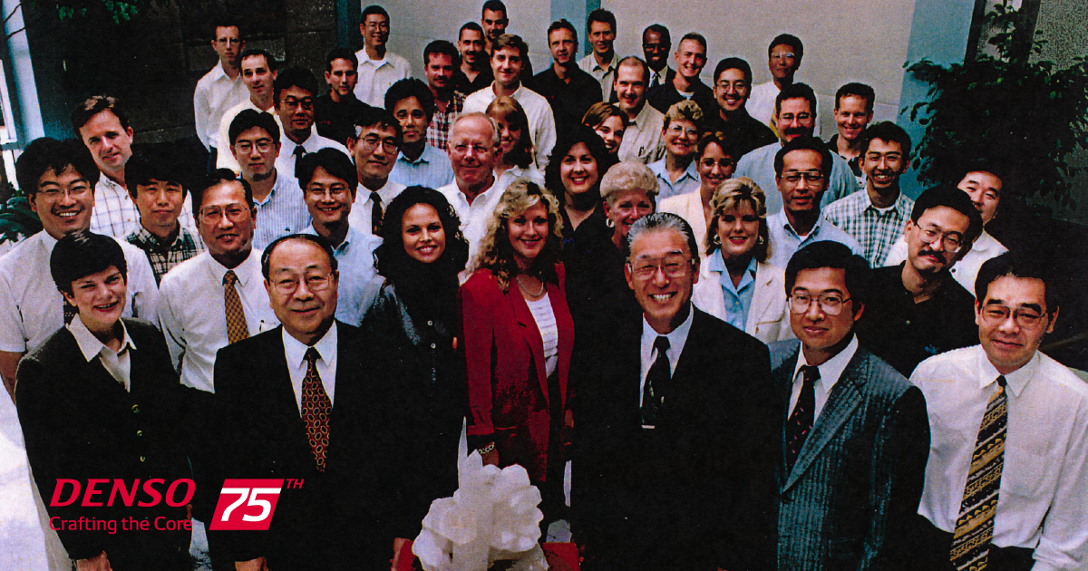 Group photo posing with GM Award