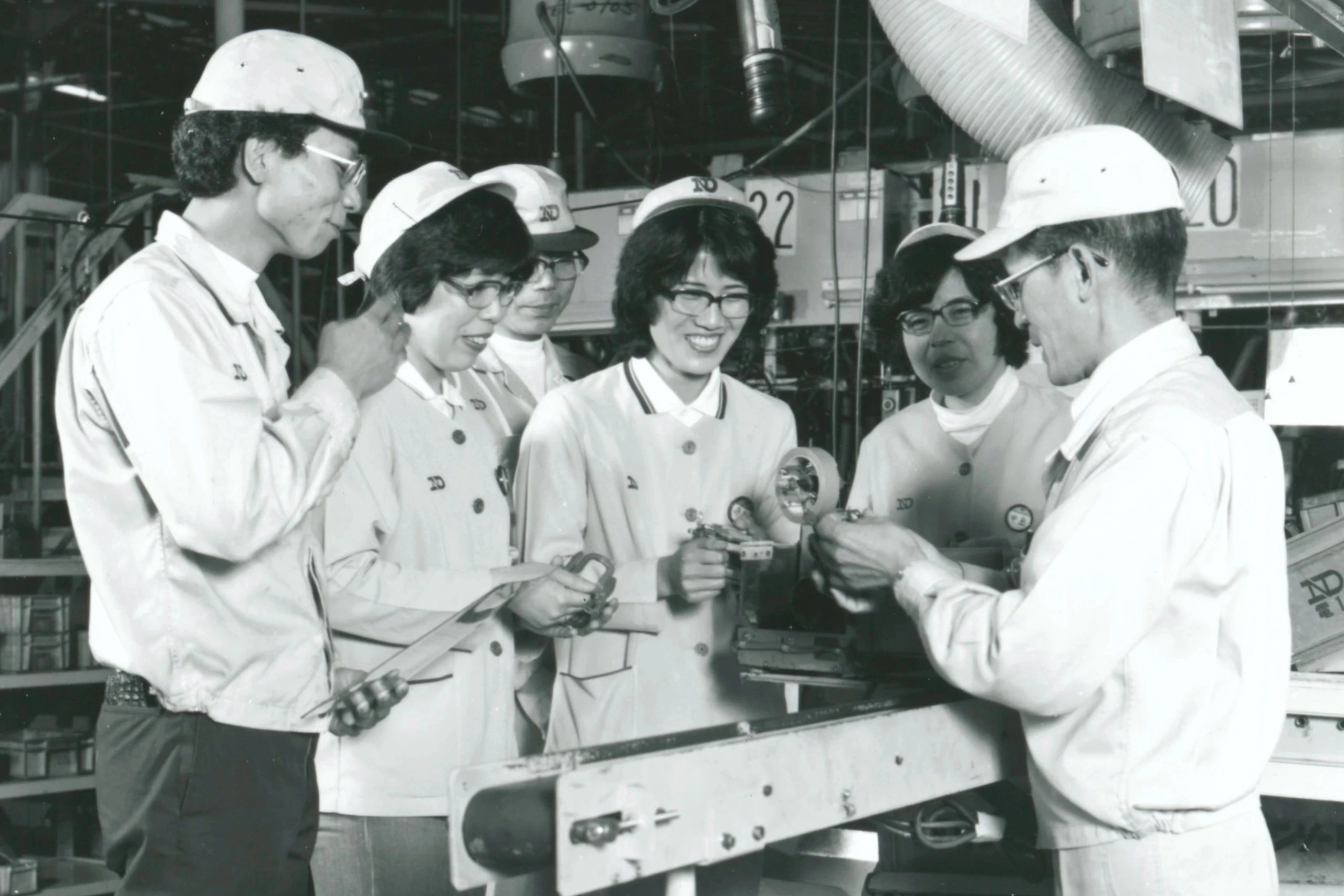 DENSO Team Members Collaborating