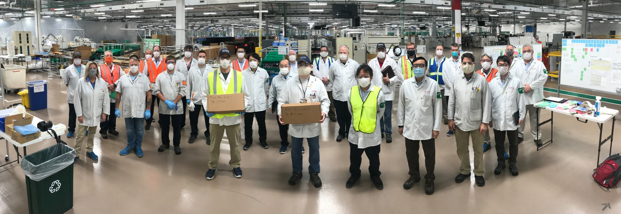 Group of People In Manufacturing Area