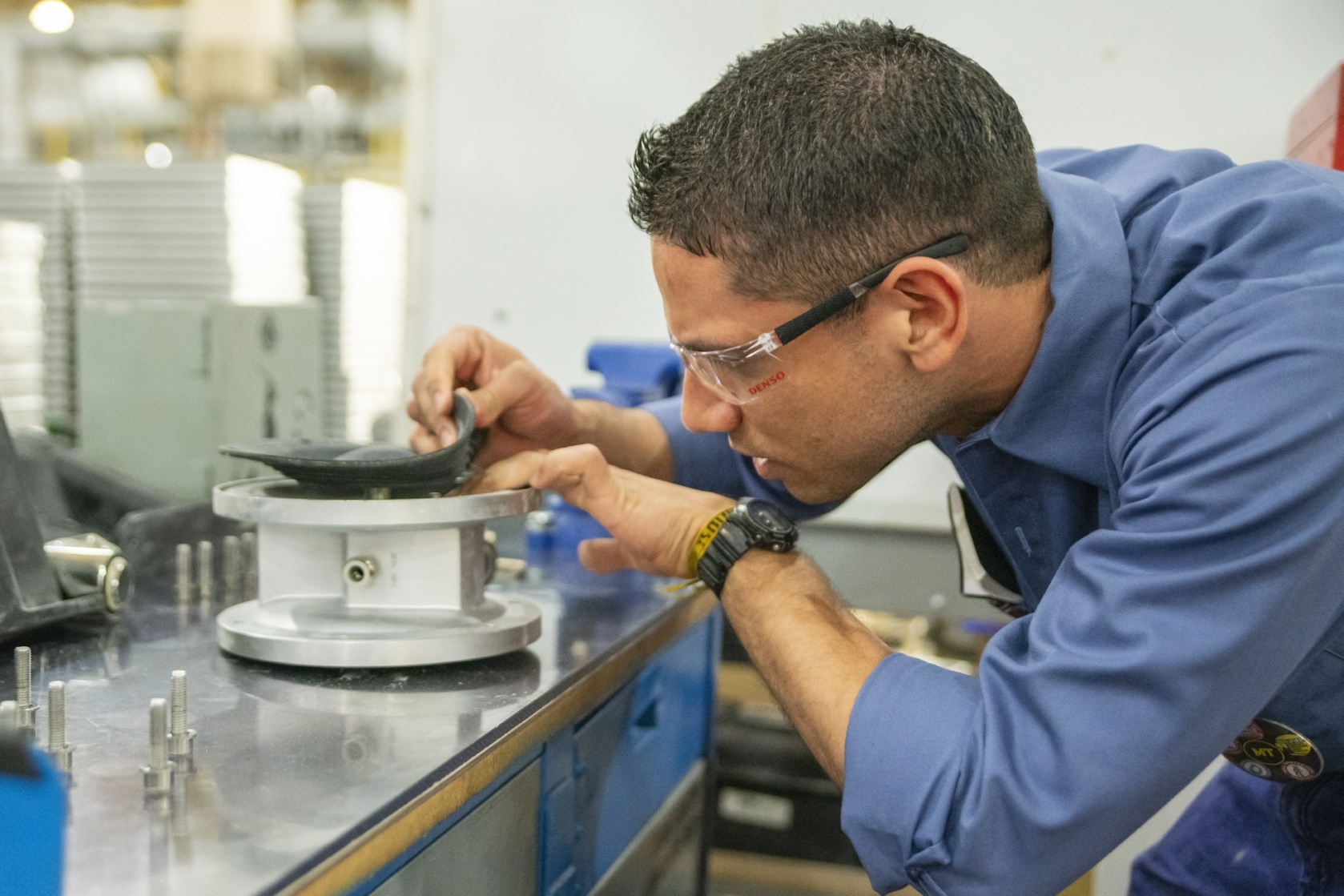 Juan Working as a Machine Tech